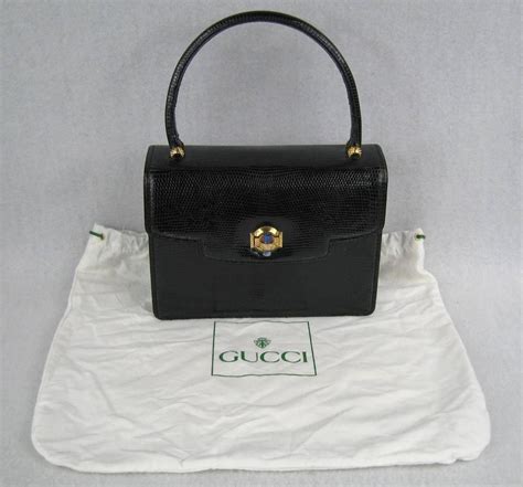 black leather gucci purse with circle discs|vintage Gucci black purses.